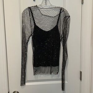 Endless rose camisole with crystal mesh overlay. Never worn. Size medium.